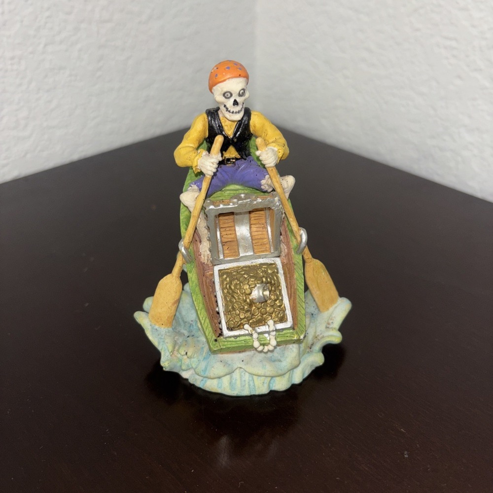 Aquarium decoration, skeleton pirate on row boat with treasure